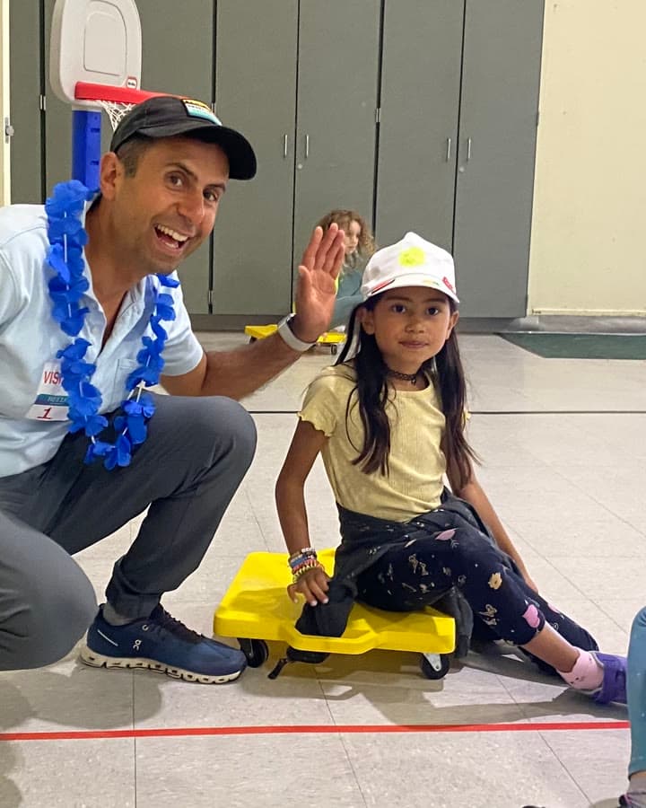 With his daughter at Reed School